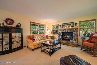 Living room with river rock fireplace