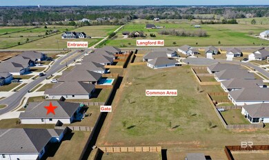 Aerial of common area backing up to the home