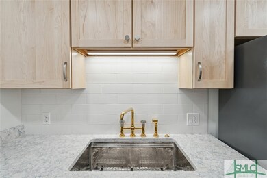 Beautiful custom sink with brass fixtures