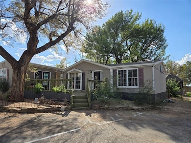 View of front facade featuring a deck