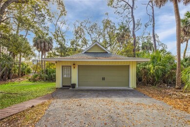 Front view of home's detached garage with large &