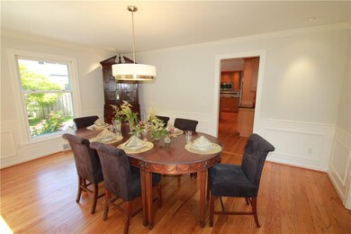 Formal Dining Room with picture frame molding and 