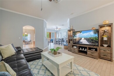 Living room view of Kitchen dining and sliders to