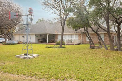 Large backyard with covered patio and open deck fo