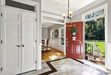 The Foyer includes a Marble Tile Floor with detail