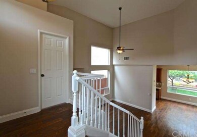 Door to powder room off the entryway