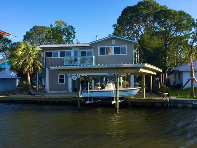 Back of the Home looking across the Canal