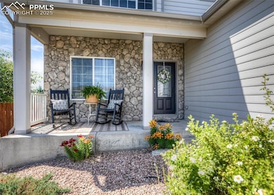 Nice-Size Covered Front Porch with Stone Accent!