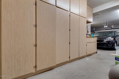 3 Car Tandem Garage w/Built in Cabinets