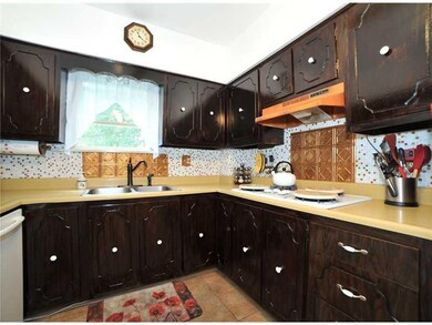 Kitchen. Ceramic floors, updated appliances, back 