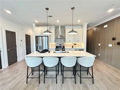 8ft quartz island with soft close cabinets and GE Applainces *Photos shown are from same floor plan, but different staged home*