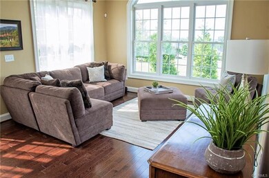 Sun-filled morning room overlooking backyard