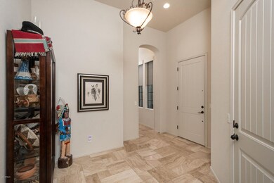 12' Ceilings + Travertine Floor Entry