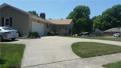Circle drive and added parking space.