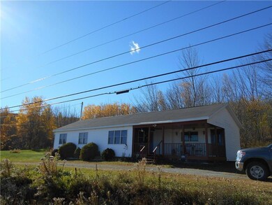 Front of home w deck overlooking...