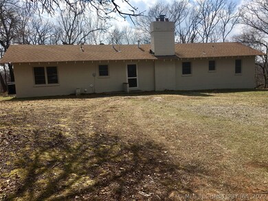 front view of cabin; lots of trees create a privat