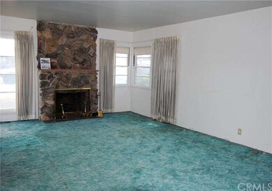 Light and Bright Front Living Room w/ Stone Firepl