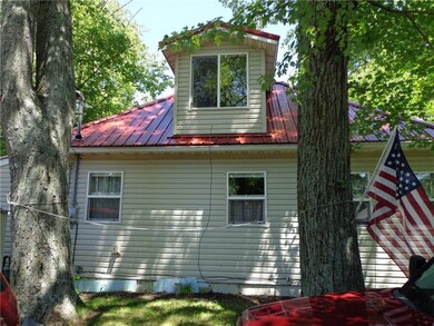 Side of house; loft window