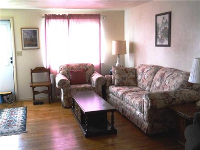 Living Room. Bright living room with hardwood floo
