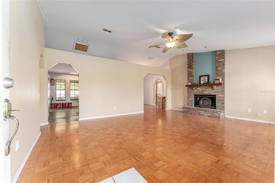 Living Room (kitchen and dining room through the arches)