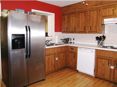 THE NORTH AND EAST WALL OF THE KITCHEN. NOTE THE O