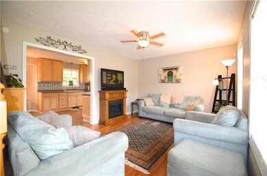 BEAUTIFUL LIVING ROOM OPENS TO LARGE KITCHEN AND D