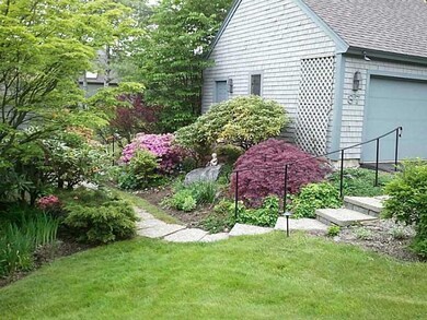 Yard/Garden. The walkway to the...