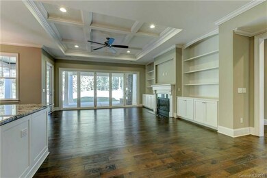 A coffered ceiling, a retractable window wall, bui