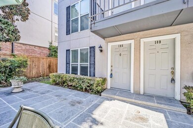 Property entrance with a patio area
