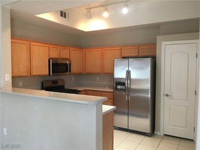 Kitchen featuring stainless steel appliances, ligh