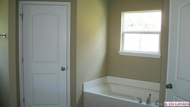 Master bath showing garden tub and one of two larg
