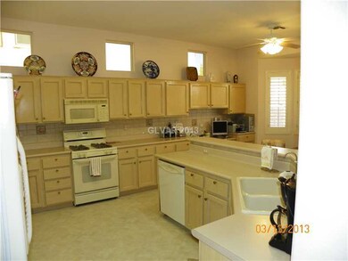Kitchen. Kitchen features extended cabinets/desk i