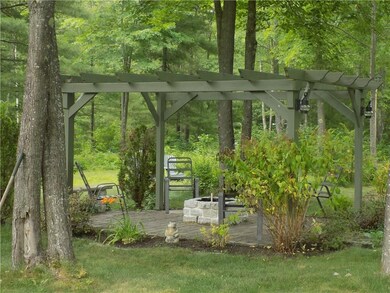 Relax by the custom fire pit patio....