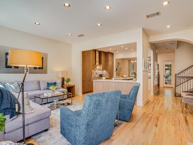 Living room featuring recessed lighting, light wo