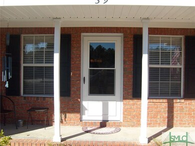 Welcoming Front Porch to Entrance.  Storm Door for