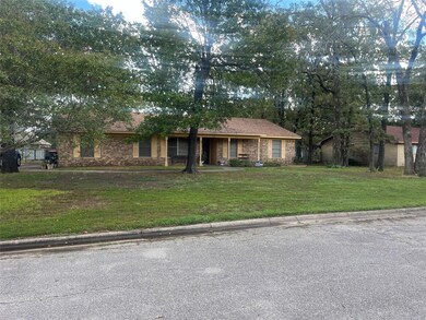 Ranch-style house with a front yard