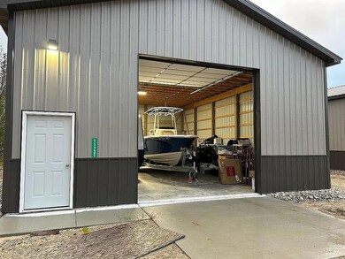 11731 N Star Dr unit C, Charlevoix, MI 49720 - photo 3