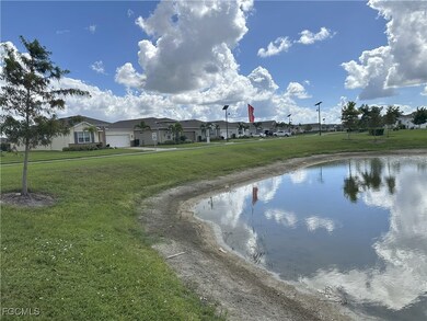 Water view with nearby suburban area