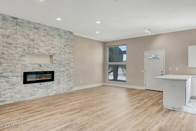 LIVING ROOM LOOKING TO ENTRY