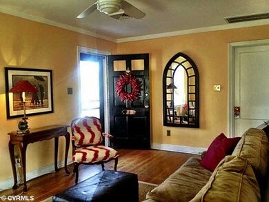 Living Room - Charming living room with hardwood f
