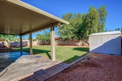 Covered Patio, Grassy Privacy Backyard