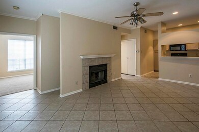 Living area has fireplace and remote control ceili