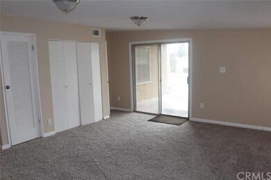 large bonus room with new carpet and paint leads o