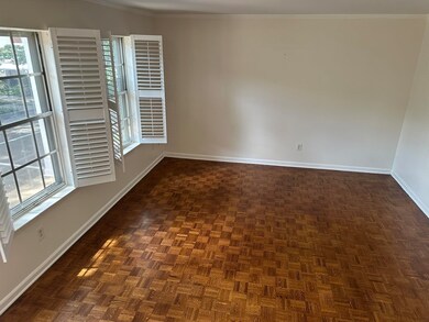 Unfurnished room featuring plenty of natural light