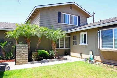 A view of the enclosed front yard area.