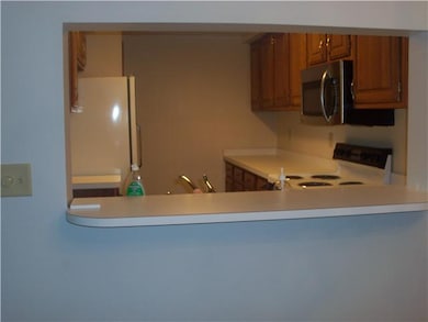 Dining Room. The dining room has a breakfast bar f