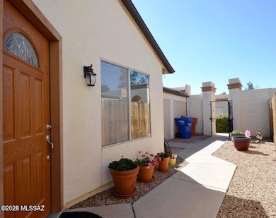 Front area to gate and into yard