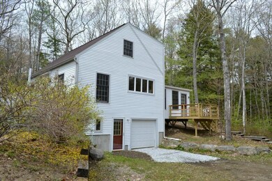 Side view of house with new deck and...
