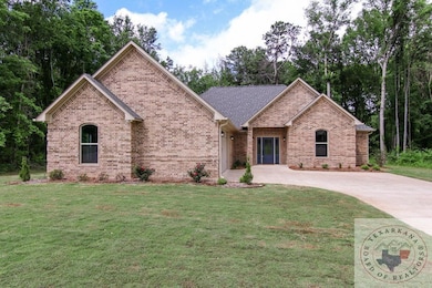 1048 Brown Dr, Wake Village, TX 75501 - photo 2