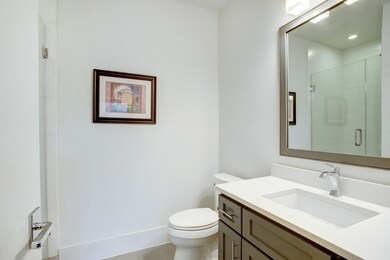 First floor bathroom with frameless glass shower,